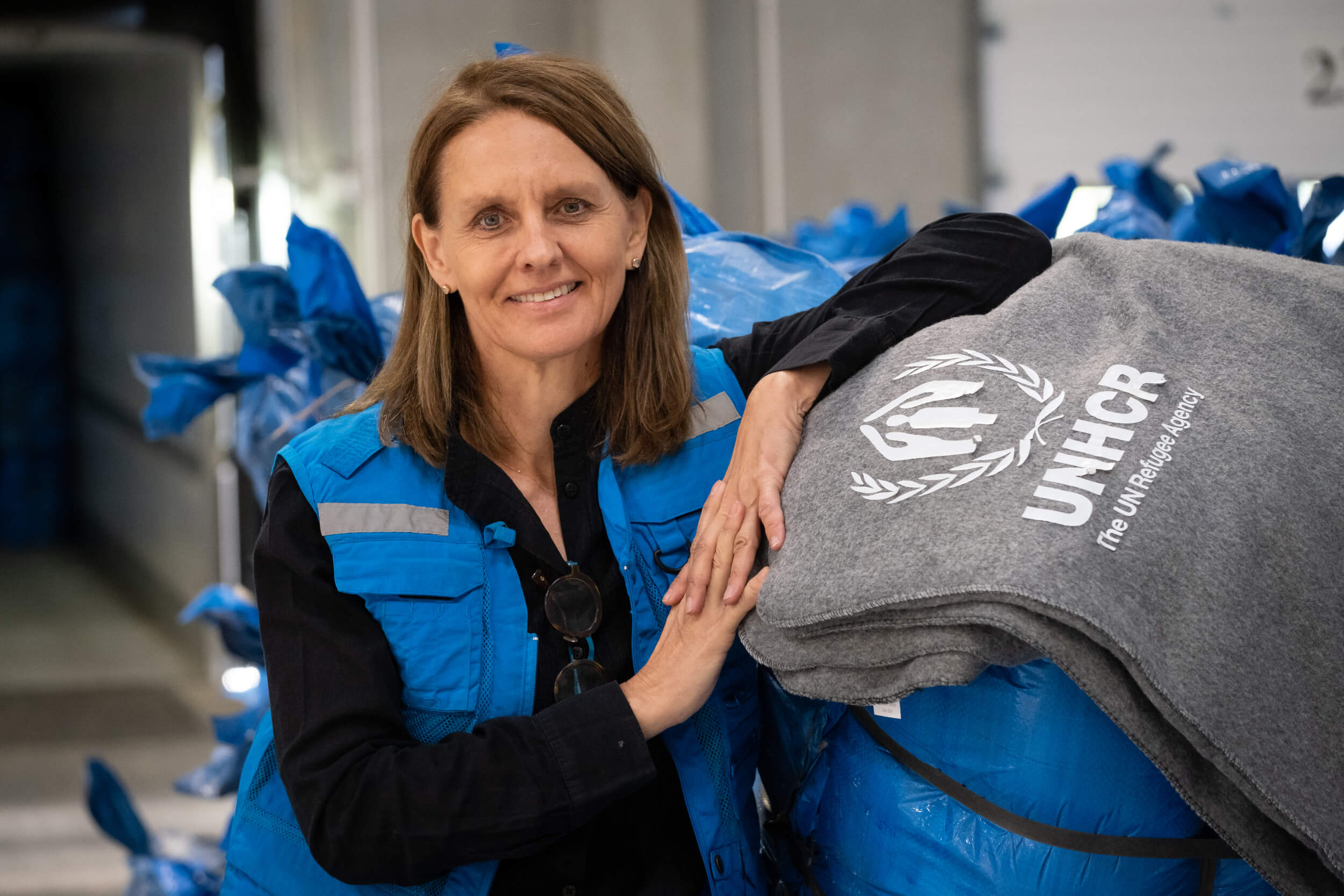 Astrid van Genderen Stort, Chief, DER Emergencies and External Engagement Section atUNHCR warehouse in Rzeszow 