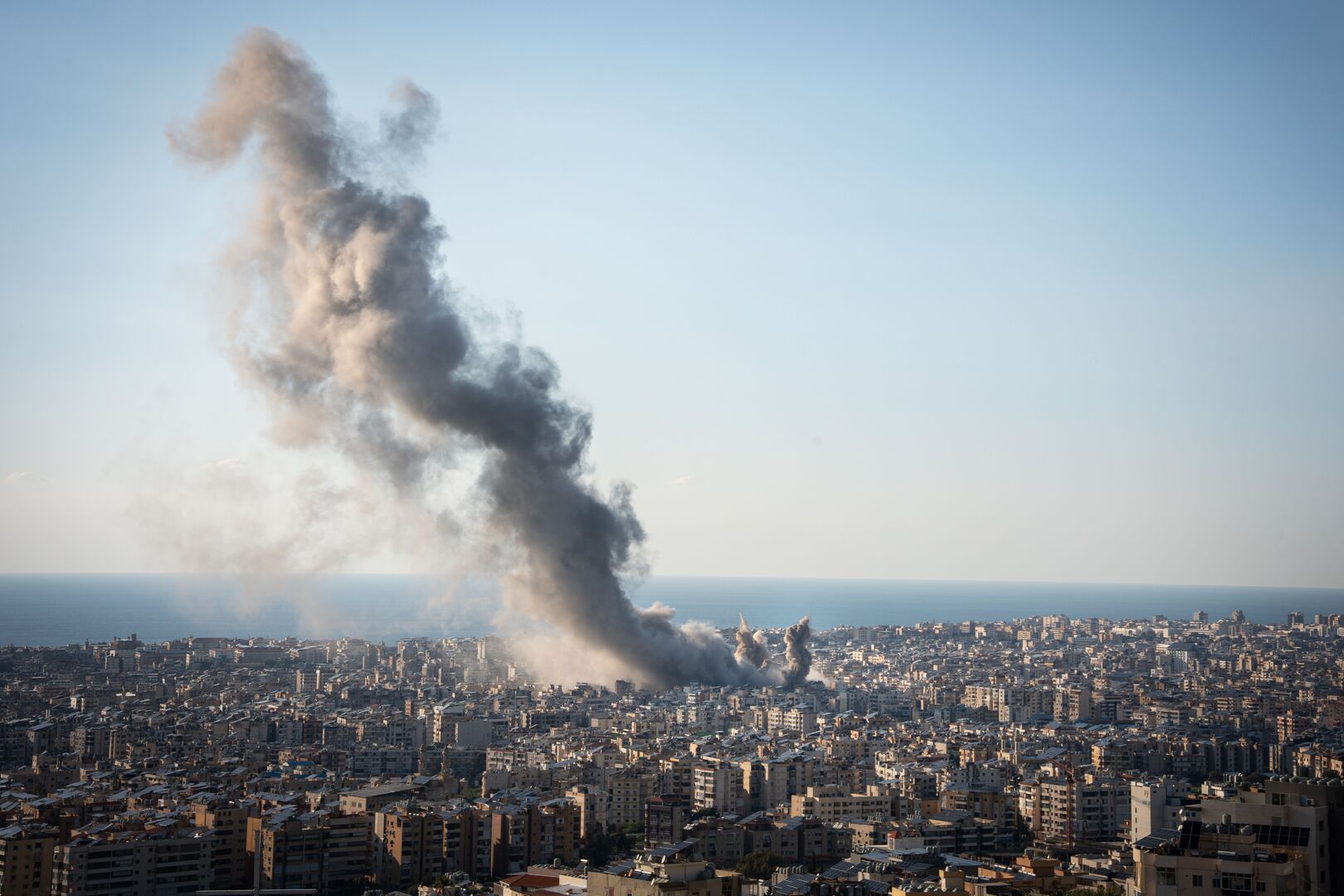 A plume of smoke rises following an airstrike in Beirut, Lebanon
