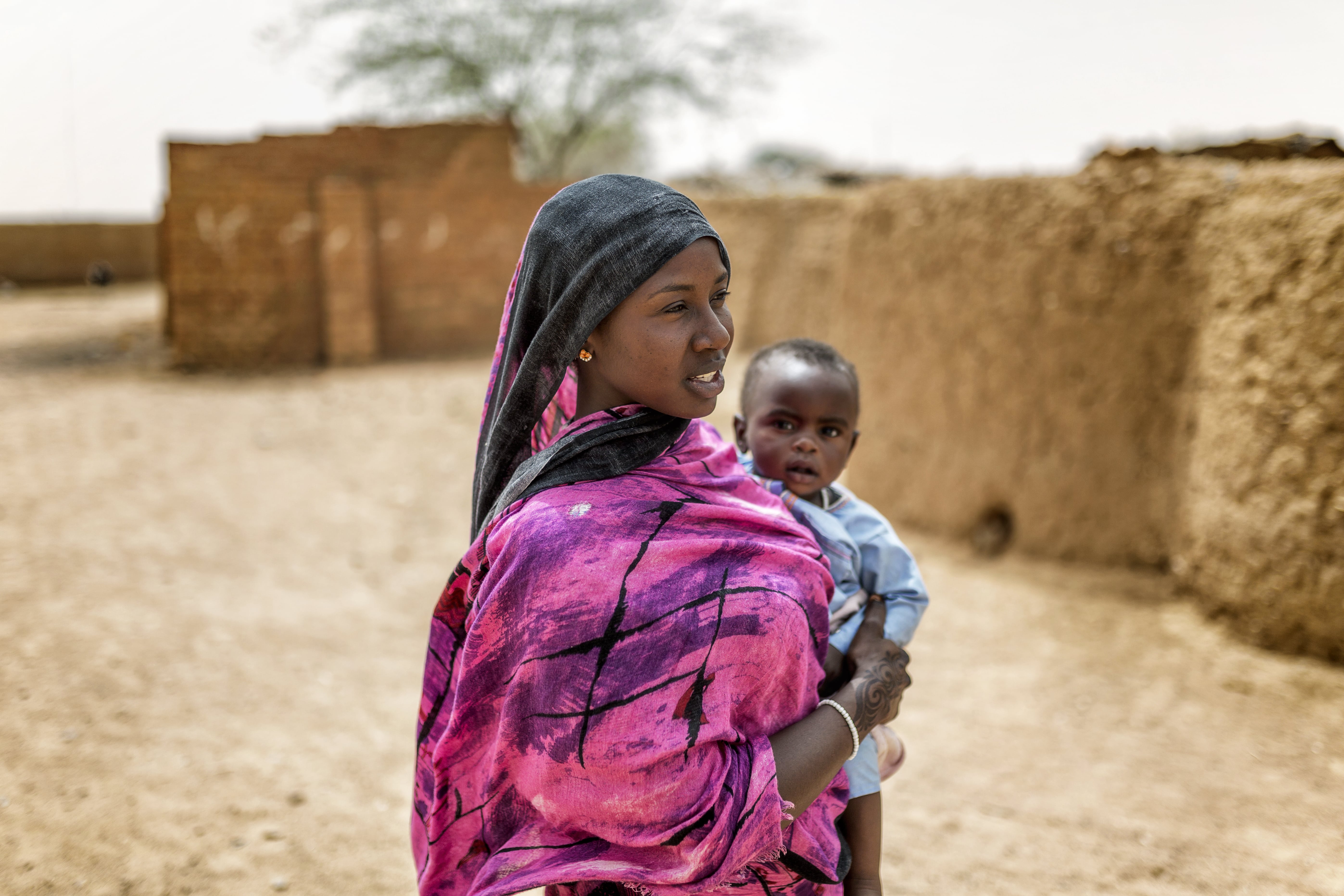 Djawahir, 24, and her 12-month-old baby boy Houssni live in Kounoungou refugee camp, eastern Chad, March 2021.