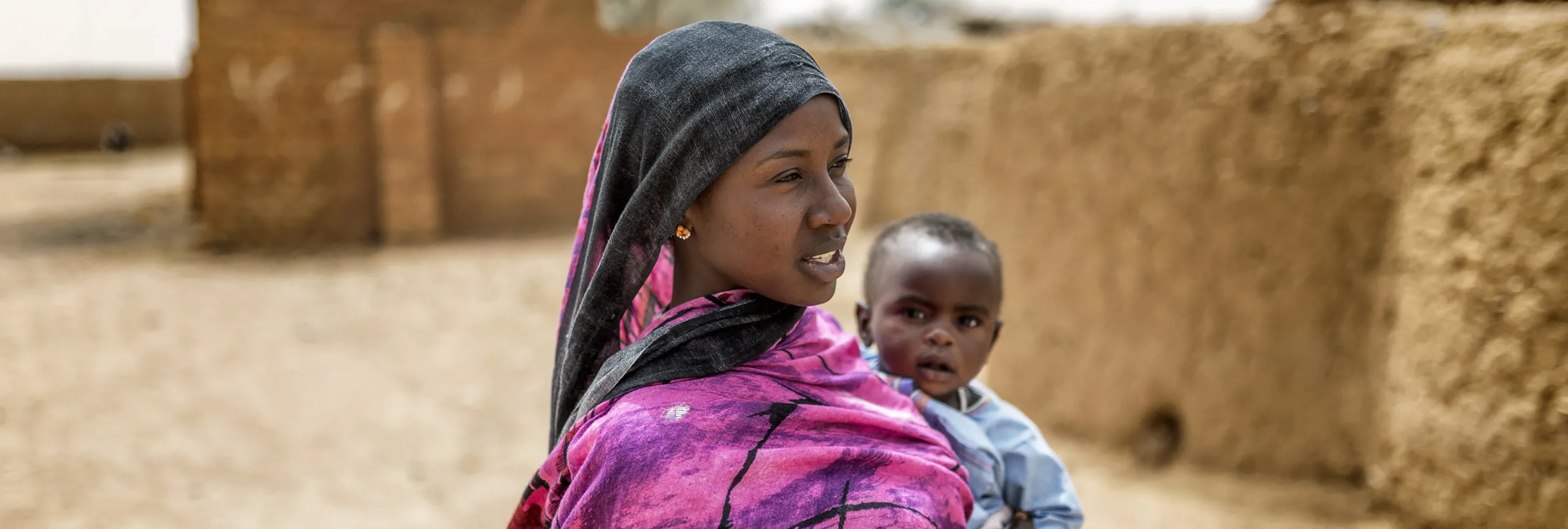 Djawahir, 24, and her 12-month-old baby boy Houssni live in Kounoungou refugee camp, eastern Chad, March 2021.